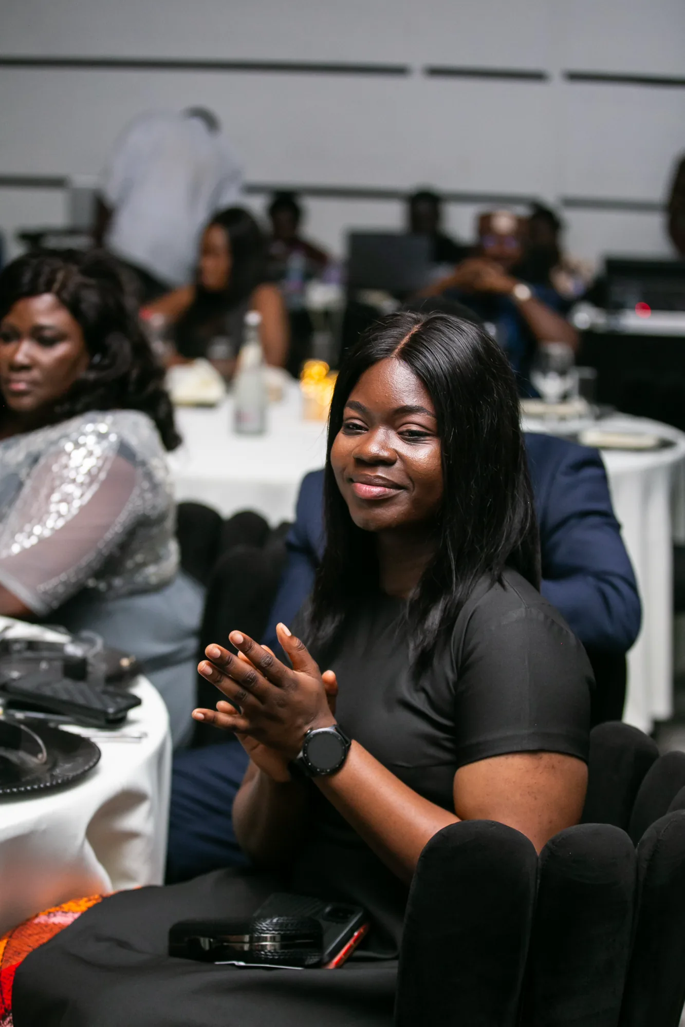 A PETROSOL colleague applauding during the awards ceremony
